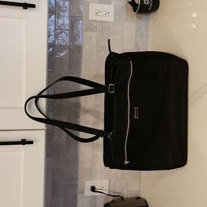 Tumi Voyageur Leather and Nylon women's brief.